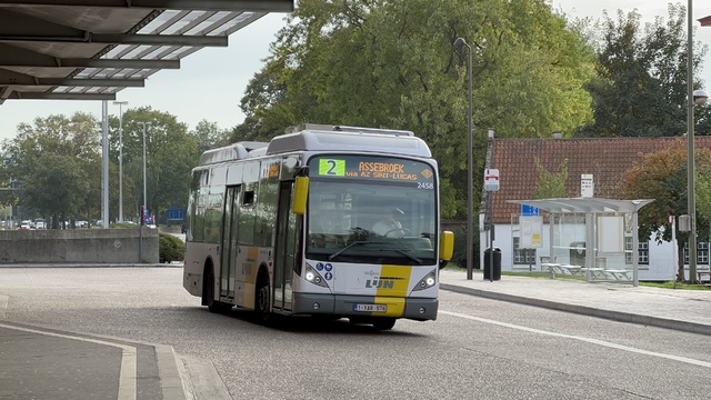 Foto van DeLijn Van Hool A309 Hybrid 2458 Midibus door_gemaakt Stadsbus