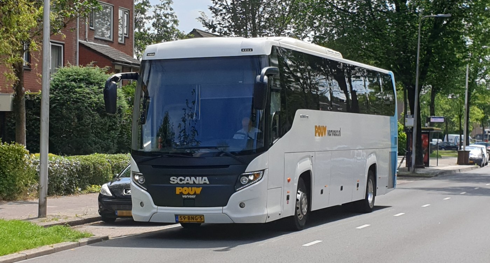 Foto van Pouw Scania Touring 411